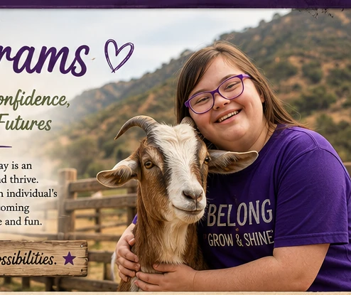 A smiling participant hugging a goat at CK Ranch